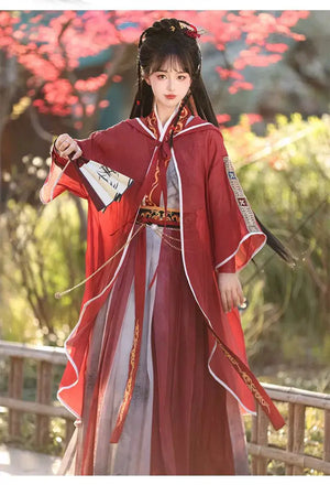 Red modern hanfu dress for women, blending traditional Song Dynasty elegance with contemporary style. Crafted from luxurious silk, this hanfu includes an optional matching coat or jacket, making it suitable for winter, casual outings, or formal occasions like graduations. Available at our online hanfu shop, offering a range of authentic hanfu for sale, this piece combines the beauty of classic Chinese clothing with modern fashion elements from top Chinese brands. Perfect for anyone looking for where to buy 