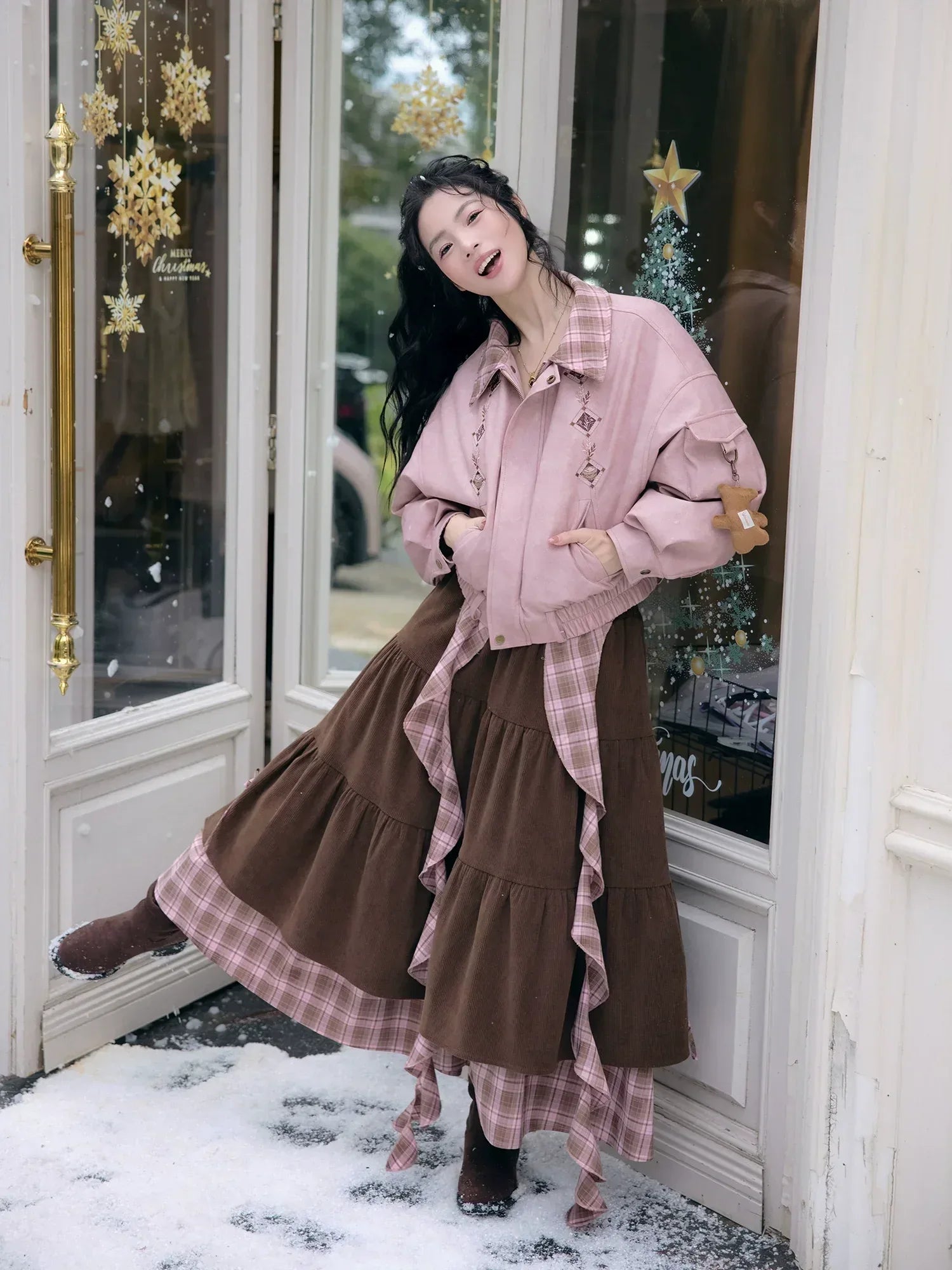 Elegant cinnamon latte winter set down jacket with faux leather finish and matching skirt for women side view