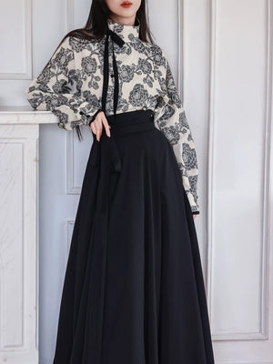 Elegant flower branch ink tang inspired hanfu set cotton linen mandarin collar top and black 6 meter pleated skirt side view