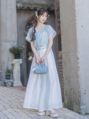 Elegant modern hanfu set light blue butterfly sleeve top with white high waist wide leg pants casual elegant daily outfit for women side view