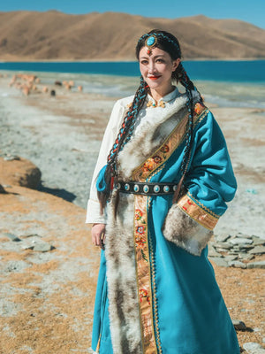 Elegant peacock blue traditional tibetan robe wearable art for modern cultural experience side view