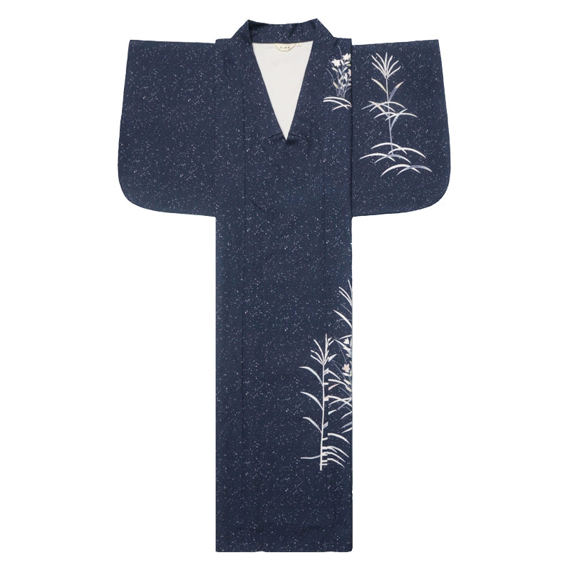 Flat-lay of blue Japanese kimono yukata with white floral patterns.