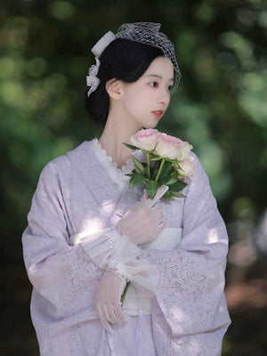 Side profile of a purple lace Taisho Romance kimono with roses.