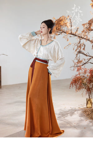 This orange modern hanfu features elegant hanfu sleeves, a stylish hanfu jacket, and timeless Ming Dynasty hanfu charm. Perfect as a princess hanfu dress, fairy hanfu dress, or casual hanfu, it’s great for hanfu cosplay or as a warm winter hanfu. Pair with a hanfu shirt or wear it as a modern hanfu dress. Shop authentic orange hanfu at our trusted hanfu shop, offering modernised hanfu and styles from the best Chinese designer clothing websites and modern Chinese clothes collections.