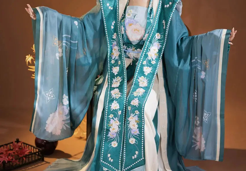 This blue hanfu with elegant hanfu sleeves is inspired by Ming Dynasty hanfu male designs. Perfect as a princess hanfu dress, it’s available in silk hanfu, cotton hanfu, and hanfu lolita styles. Featuring layered hanfu jacket options, it’s ideal for hanfu women, including plus size hanfu. Pair it with a hanfu shirt and shop authentic designs at our hanfu shop.