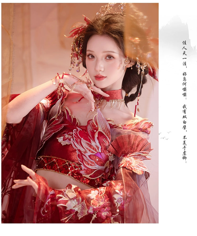 Model in Red Hanfu female Dunhuang embroidery fairy spring and summer dress with floral headpiece and delicate hand jewelry.