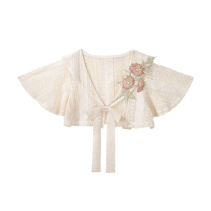 Ivory lace capelet displayed separately
