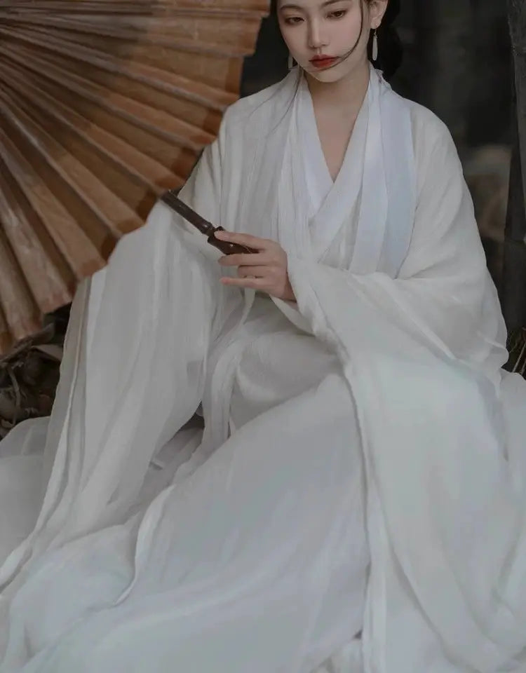 This white hanfu with flowing hanfu sleeves and elegant hanfu layers pairs perfectly with a princess hanfu dress or hanfu shirt. Inspired by Ming Dynasty hanfu male styles, it’s available in silk hanfu, cotton hanfu, and hanfu lolita designs. Suitable for all, including plus size hanfu options, it’s a must-have for hanfu woman enthusiasts. Shop now at a trusted hanfu shop.