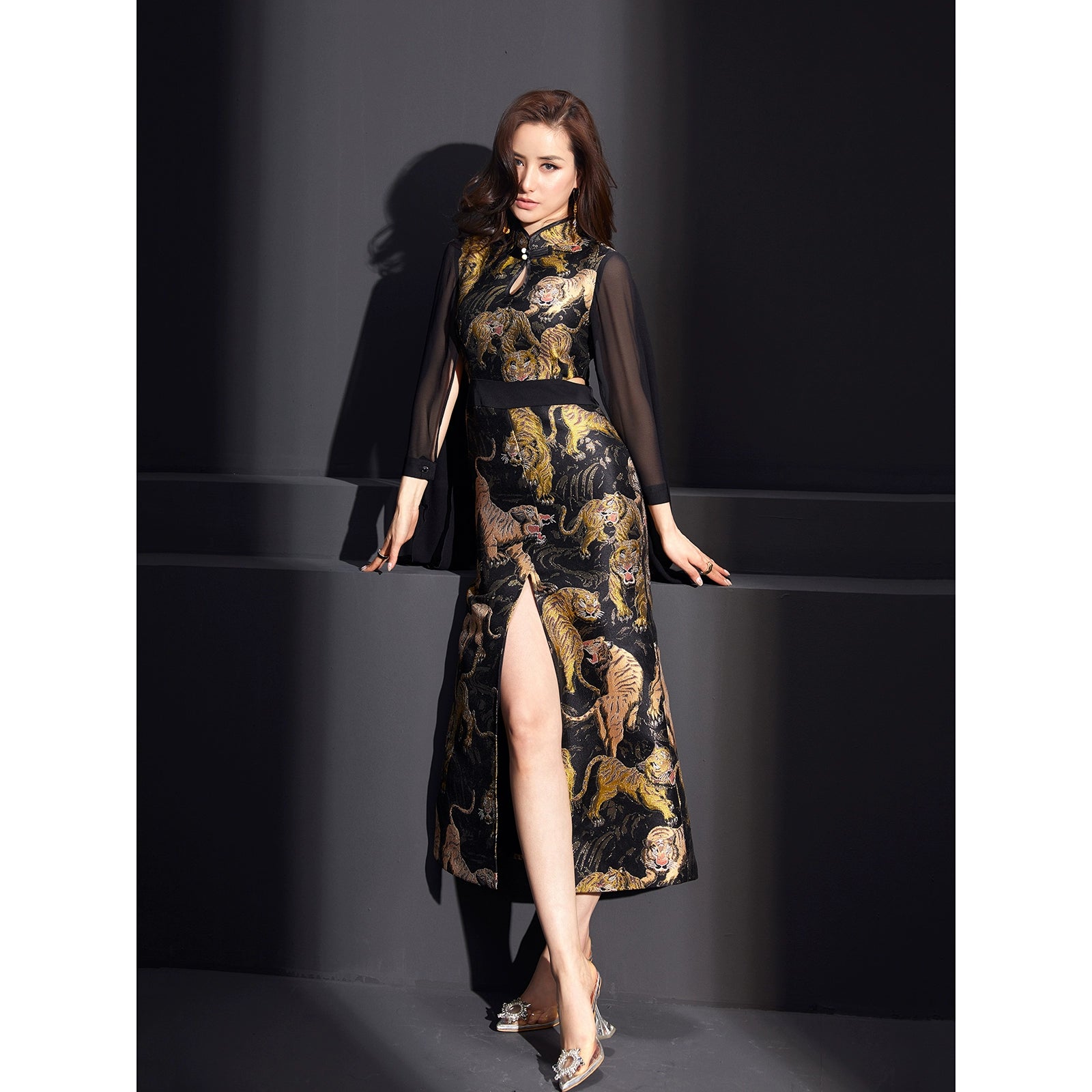 Elegant tiger pattern cheongsam with split-end design in soft satin fabric.