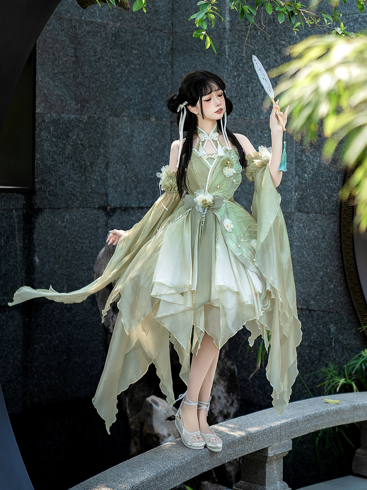 Chinese Lolita Dress Women's Summer with soft green hues and petal-like layers, ideal for themed events or fashion shoots.