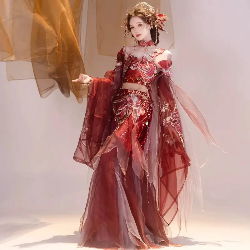 Red Hanfu female Dunhuang embroidery fairy spring and summer dress with wide sleeves and floral accessories in soft lighting.