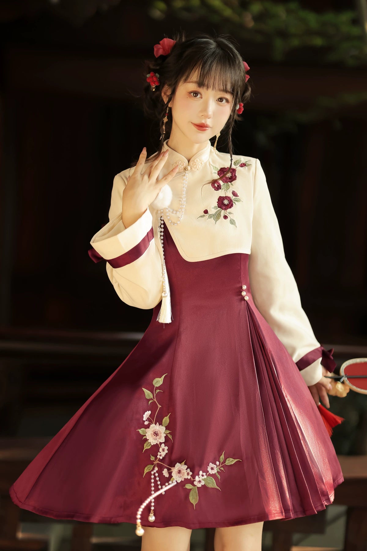 Improved cheongsam Lolita dress with cream top, burgundy skirt, floral embroidery, and Han element-inspired design.