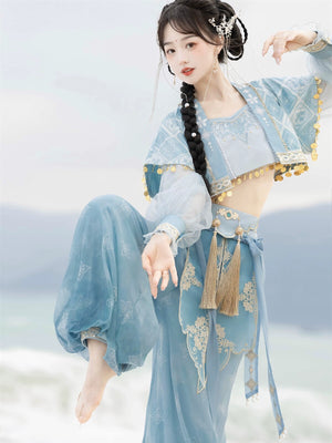 Model poses in a dance stance wearing the blue Hanfu Princess Jasmine suit by 【Cloud Traveler】, showcasing ethnic Dunhuang style.