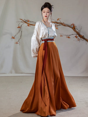 This orange modern hanfu features elegant hanfu sleeves, a stylish hanfu jacket, and timeless Ming Dynasty hanfu charm. Perfect as a princess hanfu dress, fairy hanfu dress, or casual hanfu, it’s great for hanfu cosplay or as a warm winter hanfu. Pair with a hanfu shirt or wear it as a modern hanfu dress. Shop authentic orange hanfu at our trusted hanfu shop, offering modernised hanfu and styles from the best Chinese designer clothing websites and modern Chinese clothes collections.