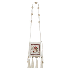 Matching tassel bag displayed separately