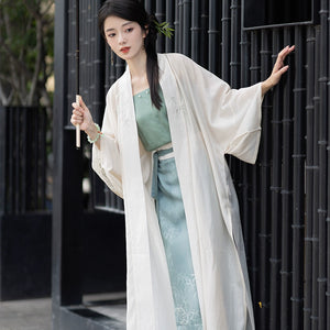 This blue modern hanfu features elegant hanfu sleeves, a stylish hanfu jacket, and timeless charm. Perfect for a princess hanfu dress, fairy hanfu dress, or casual hanfu, it suits every hanfu woman. Layer with a hanfu shirt or wear as a modern hanfu dress, inspired by Ming Dynasty hanfu. Ideal for hanfu cosplay or as a cozy winter hanfu, it’s available at our trusted hanfu shop. Wondering where to buy hanfu? Start here for authentic styles.