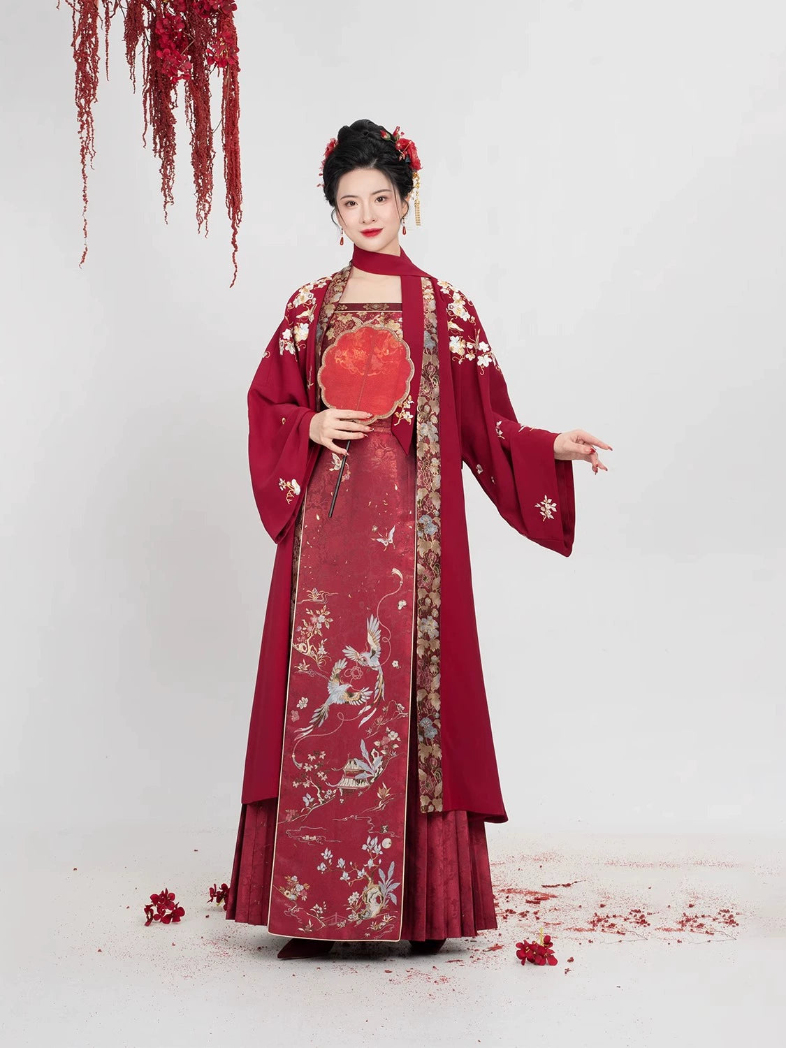 Front view of [Dan Que Acacia] New Chinese Style Red Wedding Dress with golden floral patterns and layered traditional design.