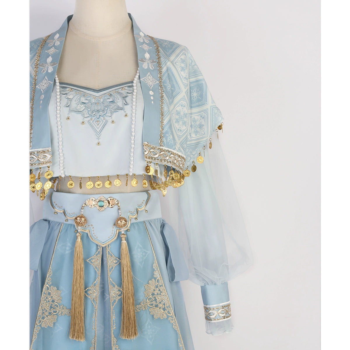 Close-up of top half of blue Hanfu Princess Jasmine suit by 【Cloud Traveler】, highlighting embroidery and coin details.