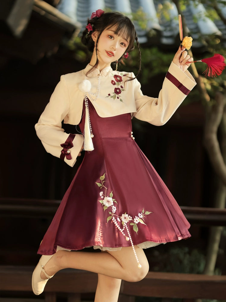 Chinese-style Lolita dress with cream top, burgundy pleated skirt, floral embroidery, and elegant pearl tassel details.