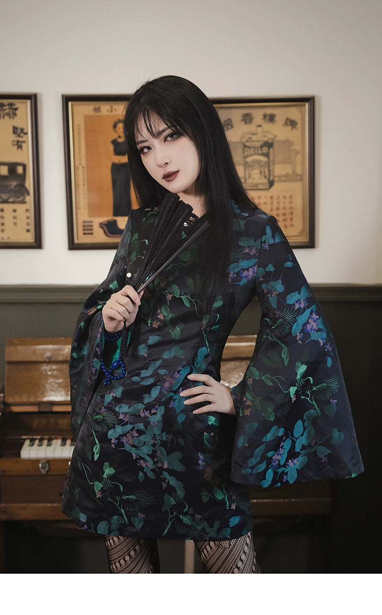 Retro-inspired black cheongsam short skirt with green floral jacquard, bell sleeves, and a glossy finish. Made from polyester, viscose, and cotton.