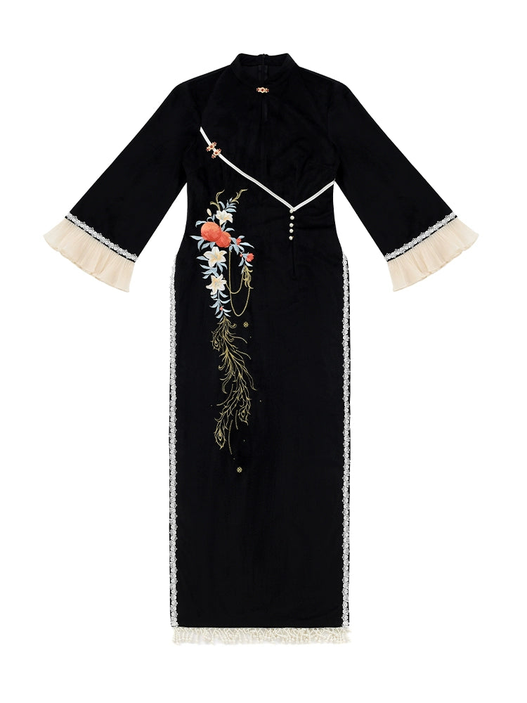 Black cheongsam dress with floral embroidery and tassel details, featuring cream pleated skirt for a traditional Hanfu look.