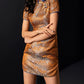 Brown cheongsam with contrasting collar and disc buckle accents.