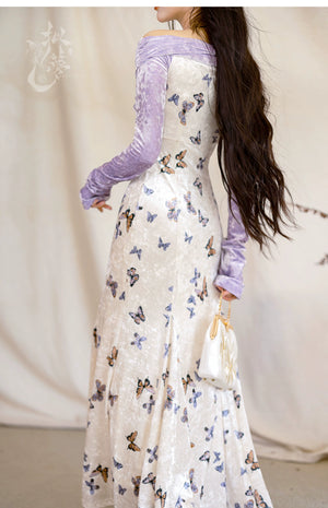 Back view of a butterfly-printed fishtail skirt with a purple velvet top, highlighting the flowing design and eco-friendly fabric.