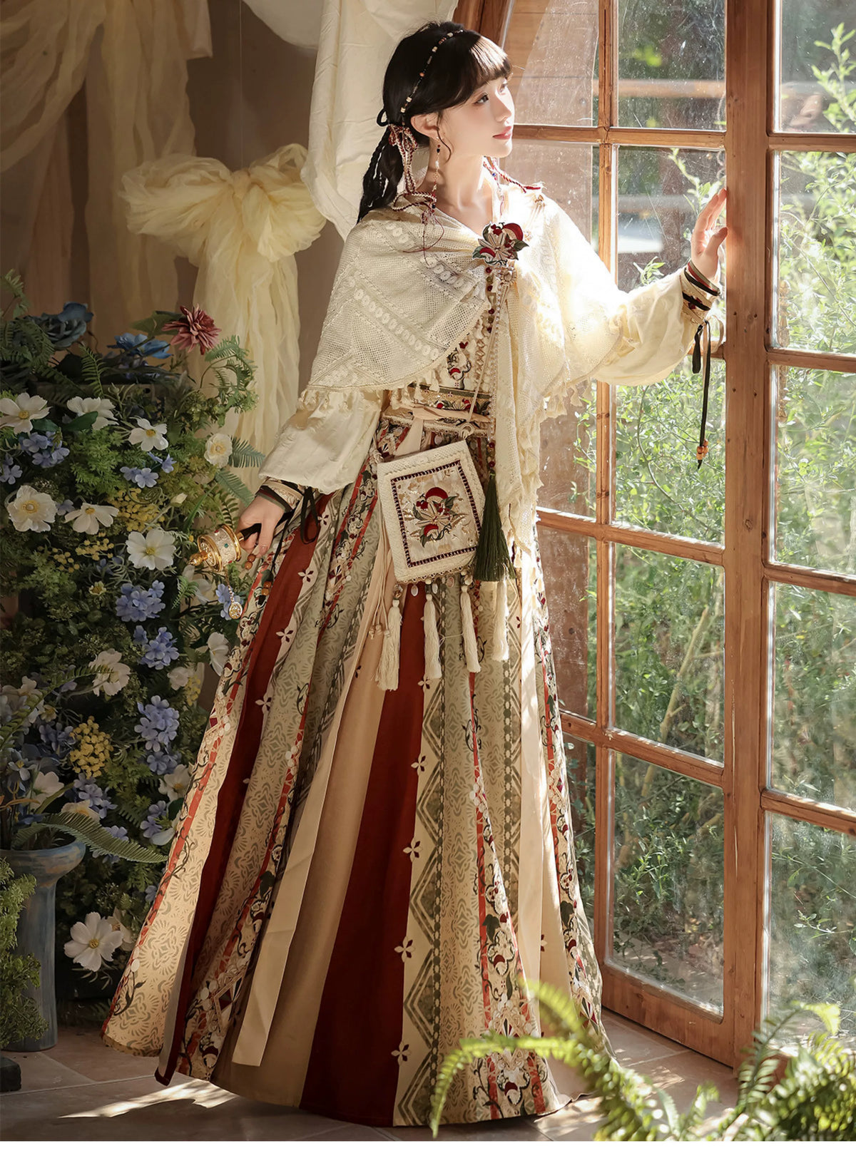 Ivory woodland four-piece outfit worn beside a window