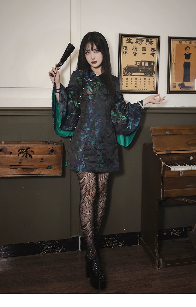 Black and green retro cheongsam dress featuring floral jacquard brocade, bell sleeves, and a slim fit. Made with a polyester, viscose, and cotton blend.