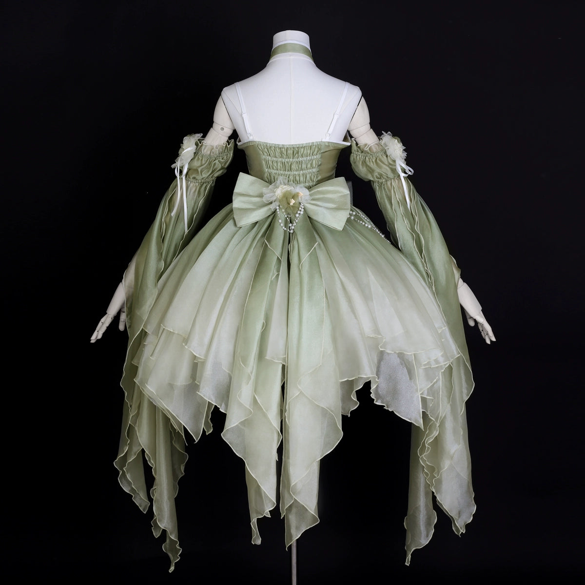 Back view of Green Lolita Dress on mannequin with layered chiffon and bow detail, perfect for Chinese Lolita fashion lovers.