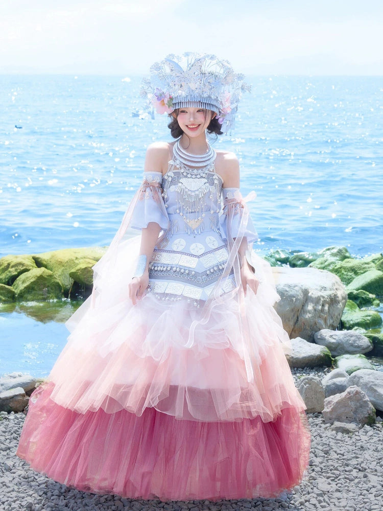 Front-facing Pink Miao Clothing Women's Summer Cake Green Dress with detailed embroidery and tiered skirt, ideal for stage performances.