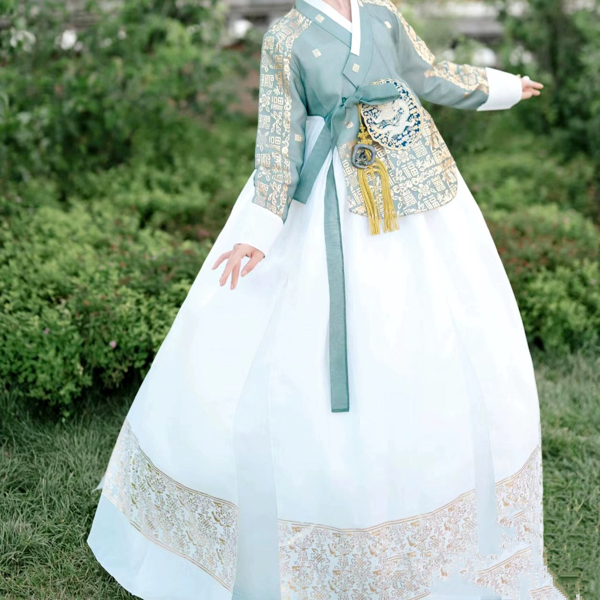 Full view of Korea Princess Hanbok showcasing gold-trimmed white skirt.