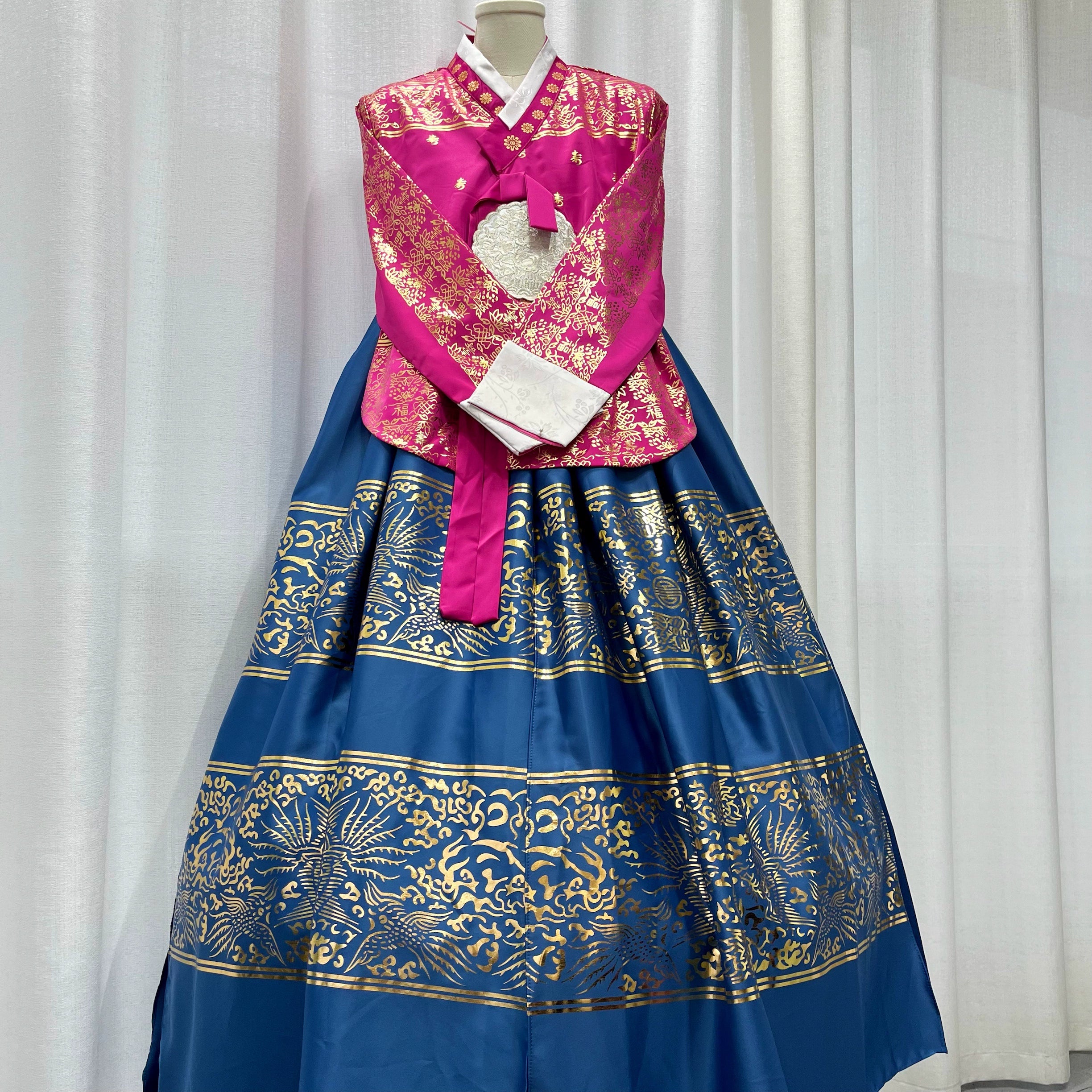 Korea Yanji Princess Court Hanbok displayed on a mannequin with gold details.