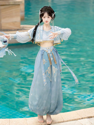 Elegant blue Hanfu Princess Jasmine suit from 【Cloud Traveler】, featuring sheer sleeves and ethnic embroidery, modeled by the poolside.