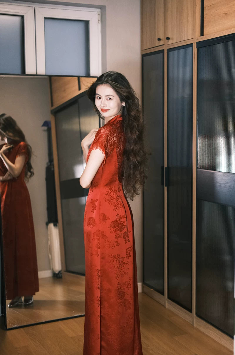 Back three-quarter view of red jacquard cheongsam in mirror-lined interior