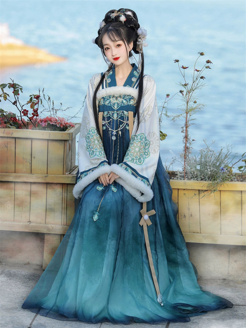 Discover our enchanting blue Hanfu for women, embodying Tang Dynasty's fairy elegance with Han elements. Perfect for daily wear in autumn and winter, our collection includes beautifully crafted shawls and cloaks that evoke a sense of historical charm