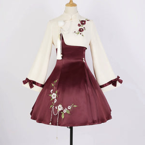 Full view of Camellia Lolita cheongsam with cream top, burgundy skirt, floral embroidery, and pearl tassel details.