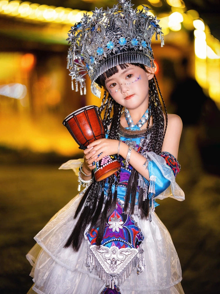 Ethnic style stage dress for girls in Miao Purple with silver crown and drum, ideal for traditional Chinese performance events.