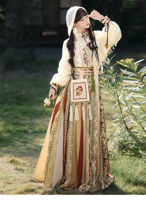 Hooded shawl worn over the full ivory outfit
