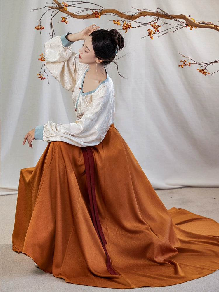 This orange modern hanfu features elegant hanfu sleeves, a stylish hanfu jacket, and timeless Ming Dynasty hanfu charm. Perfect as a princess hanfu dress, fairy hanfu dress, or casual hanfu, it’s great for hanfu cosplay or as a warm winter hanfu. Pair with a hanfu shirt or wear it as a modern hanfu dress. Shop authentic orange hanfu at our trusted hanfu shop, offering modernised hanfu and styles from the best Chinese designer clothing websites and modern Chinese clothes collections.