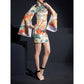 Side view of white phoenix cheongsam with split hem and flared sleeves.