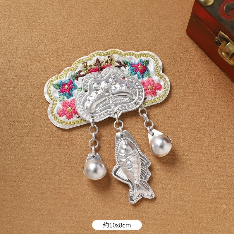 White embroidered Guizhou Miao fridge magnet with silver fish and pearl fringe, 10x8cm, handmade ethnic decor.