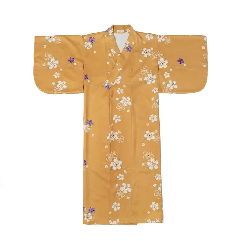 Flat-lay of an orange floral kimono yukata with wide sleeves, showcasing intricate white and purple flower patterns.