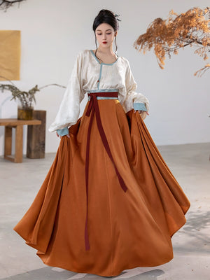 This orange modern hanfu features elegant hanfu sleeves, a stylish hanfu jacket, and timeless Ming Dynasty hanfu charm. Perfect as a princess hanfu dress, fairy hanfu dress, or casual hanfu, it’s great for hanfu cosplay or as a warm winter hanfu. Pair with a hanfu shirt or wear it as a modern hanfu dress. Shop authentic orange hanfu at our trusted hanfu shop, offering modernised hanfu and styles from the best Chinese designer clothing websites and modern Chinese clothes collections.