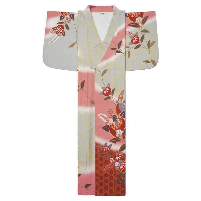 Full view of pink Japanese yukata kimono with floral patterns on a white background.