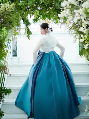 Elegant Blue Hanbok 2025 new princess palace dress with voluminous skirt and sheer sleeves, perfect for wedding or cultural stage wear.