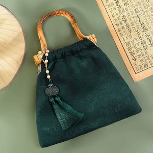 Complete your look with this elegant green cheongsam Bag, designed to complement both modern hanfu and traditional hanfu styles. Perfect for hanfu women, this bag adds charm to casual hanfu, hanfu cosplay, or layered hanfu outfits. A must-have hanfu accessory, it’s ideal for carrying essentials while maintaining an authentic style. Wondering where to buy qipao or accessories? Shop now at our trusted hanfu shop for the best modernised hanfu bags.