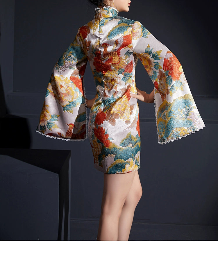 Back view of white phoenix cheongsam highlighting vibrant jacquard fabric.