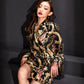 Sophisticated jacquard Cheongsam blazer dress with floral and gold accents.