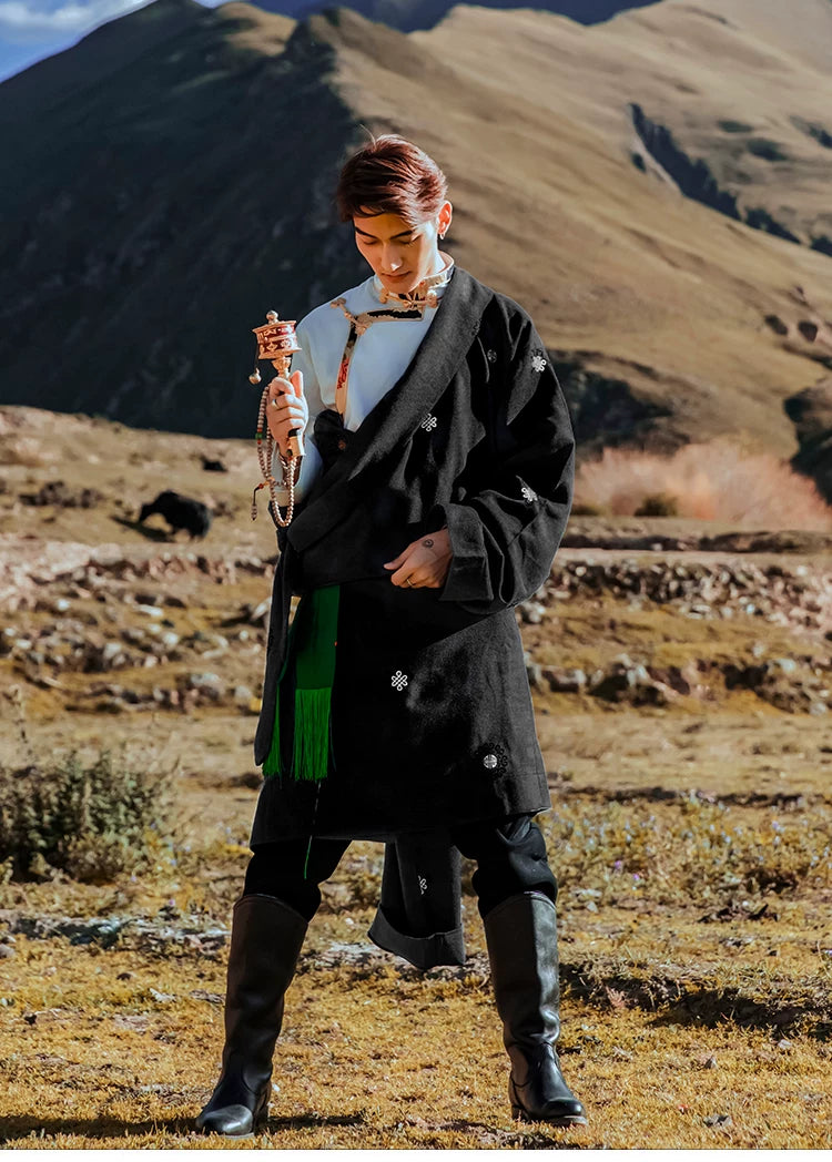 Kangba black Tibetan robe lifestyle photo with mountain background
